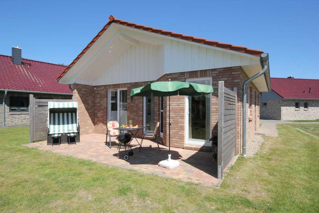 Feriendorf Suedstrand Haus 33 เพลเซอร์ฮาเคิน ภายนอก รูปภาพ